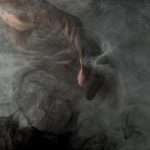 partial view of male hand in grey smoke 2023 11 27 05 22 50 utc