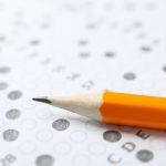 test score sheet with answers and pencil close up 2023 11 27 04 58 33 utc