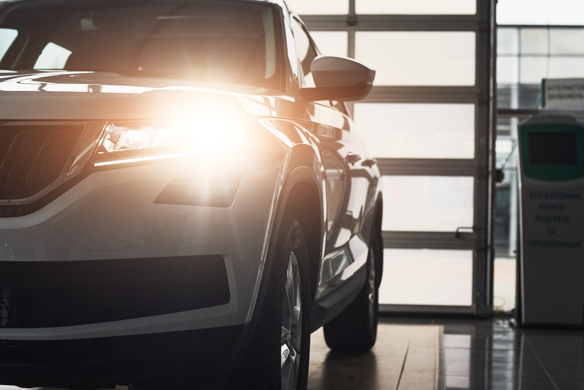 the headlights and the hood of a new luxury car 2023 11 27 05 25 11 utc