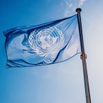 un flag waved against the sun and blue sky 2023 11 27 05 29 35 utc