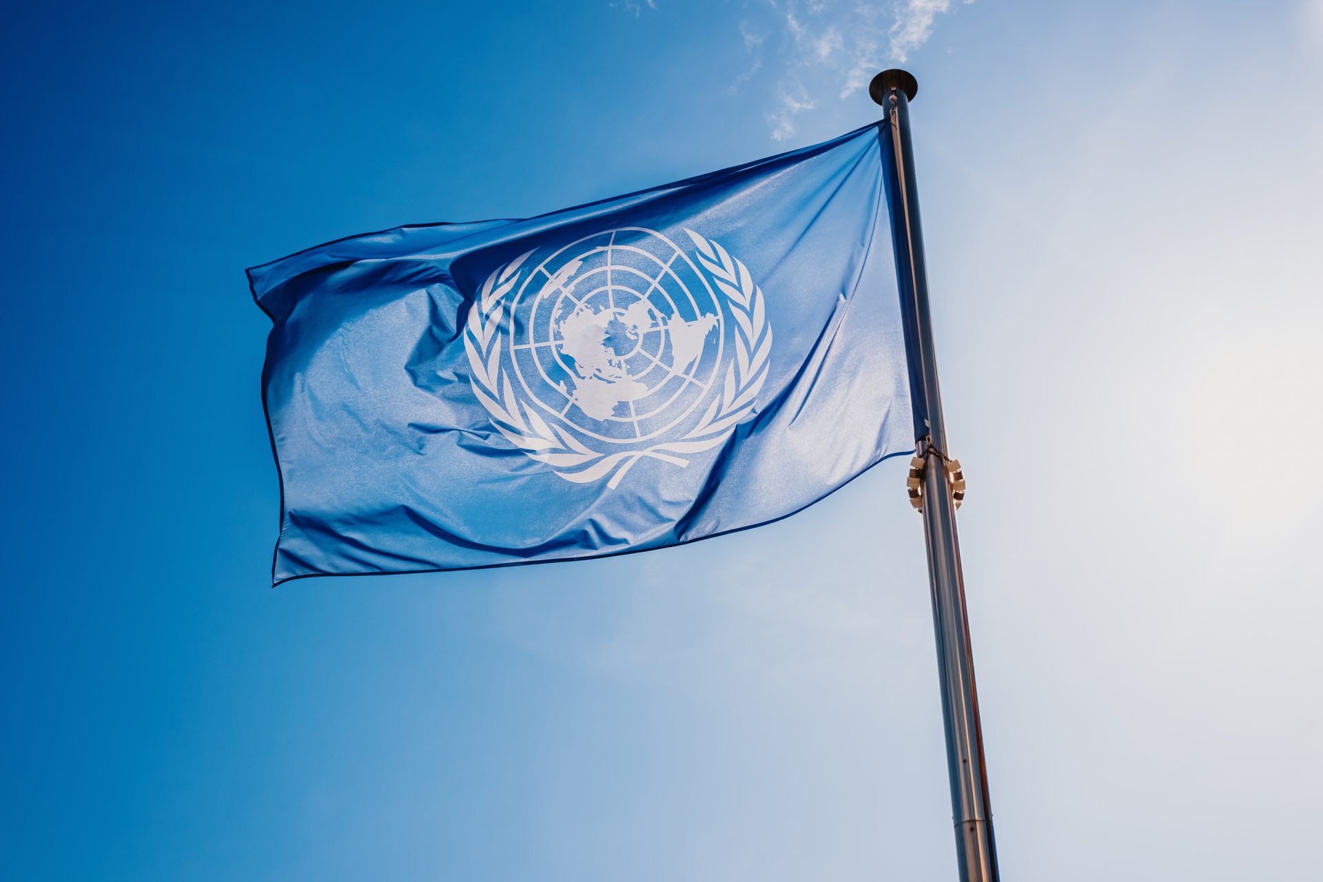 un flag waved against the sun and blue sky 2023 11 27 05 29 35 utc