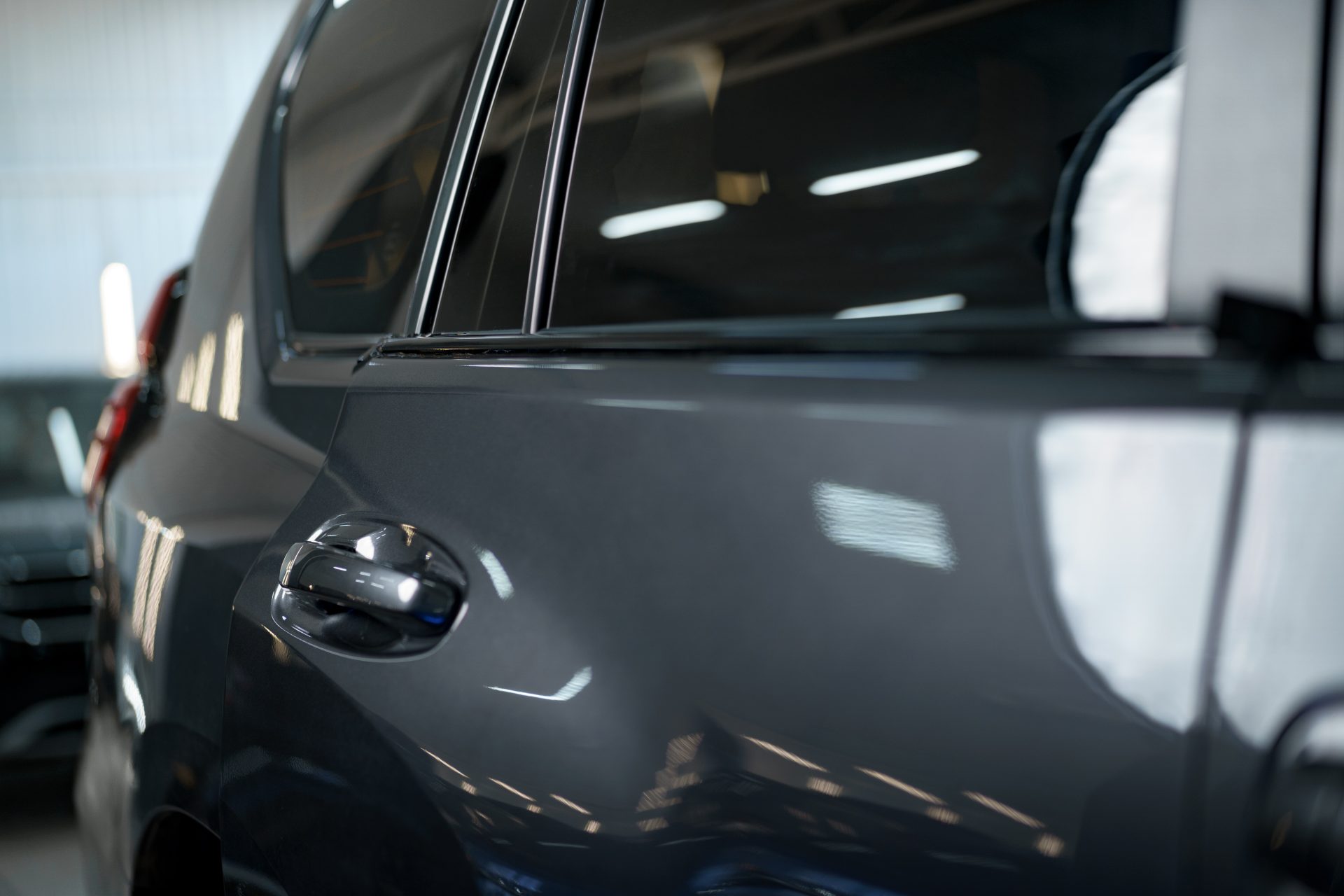 a view of dark gray car rear door and window 2023 11 27 04 58 32 utc