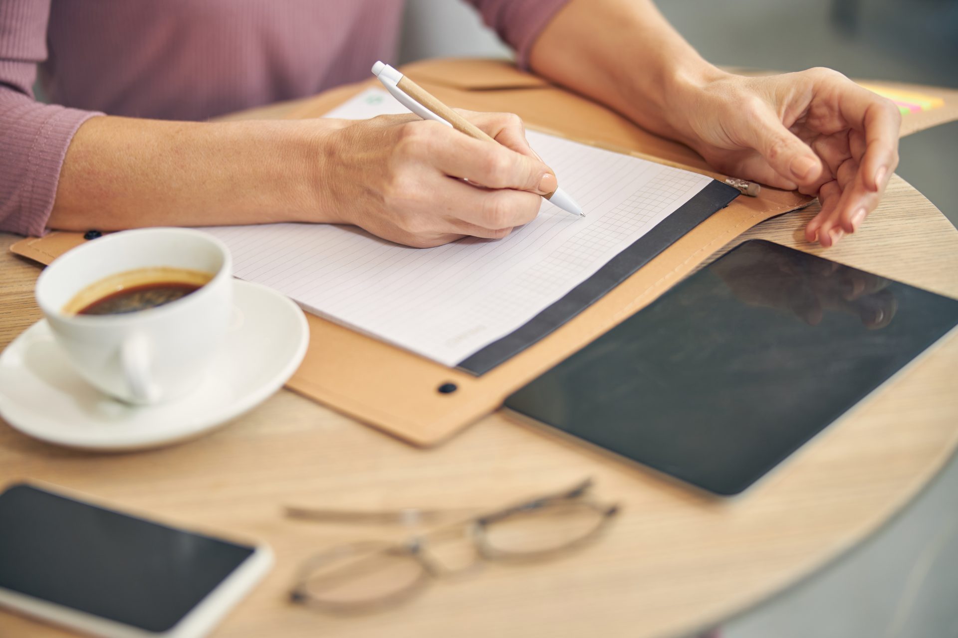 busy female person making notes during work 2023 11 27 05 12 32 utc