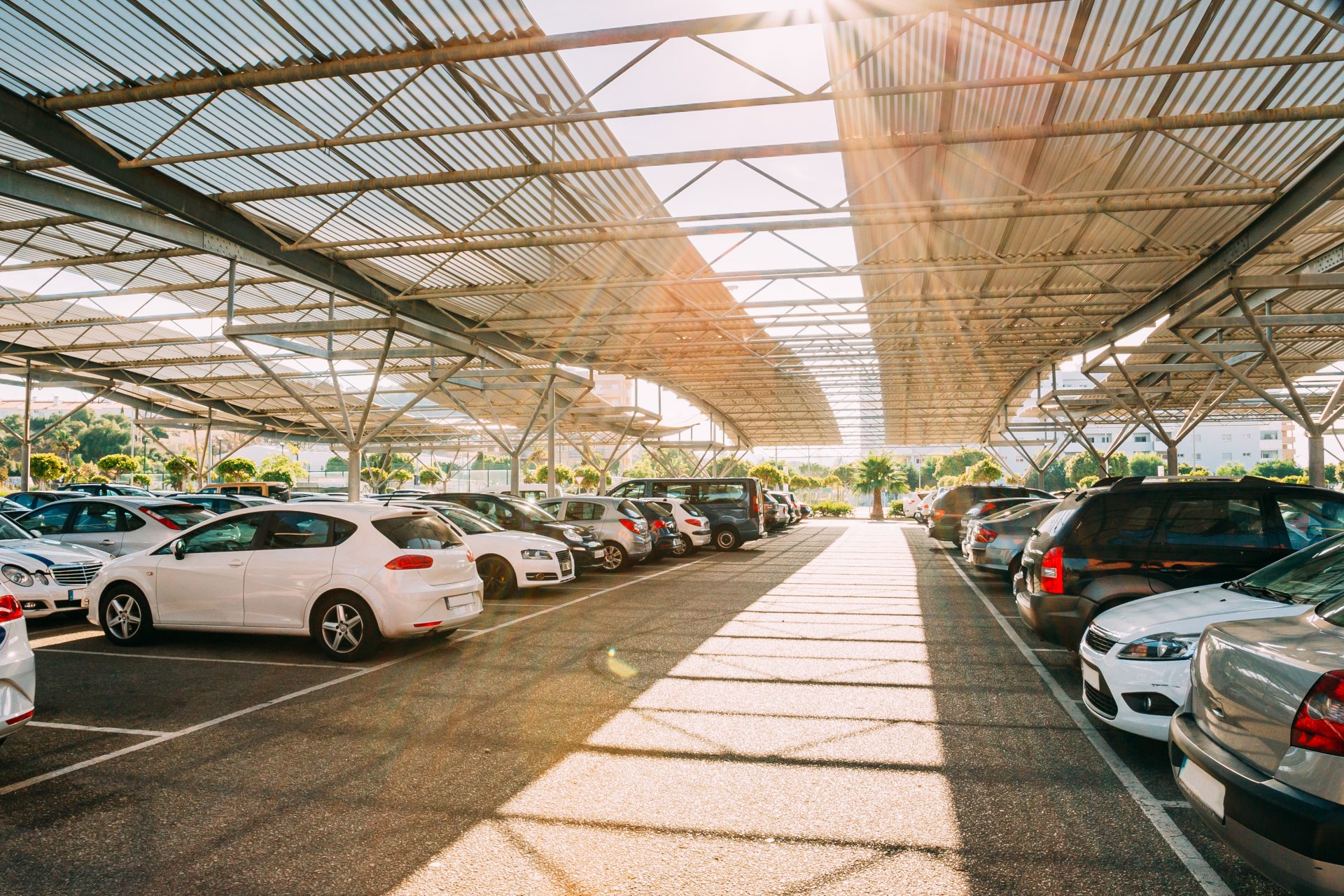 cars on a covered parking lot in sunny summer day 2023 11 27 05 12 19 utc