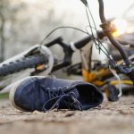 close up of a sneakers on the road near bicycle af 2023 11 27 04 55 43 utc