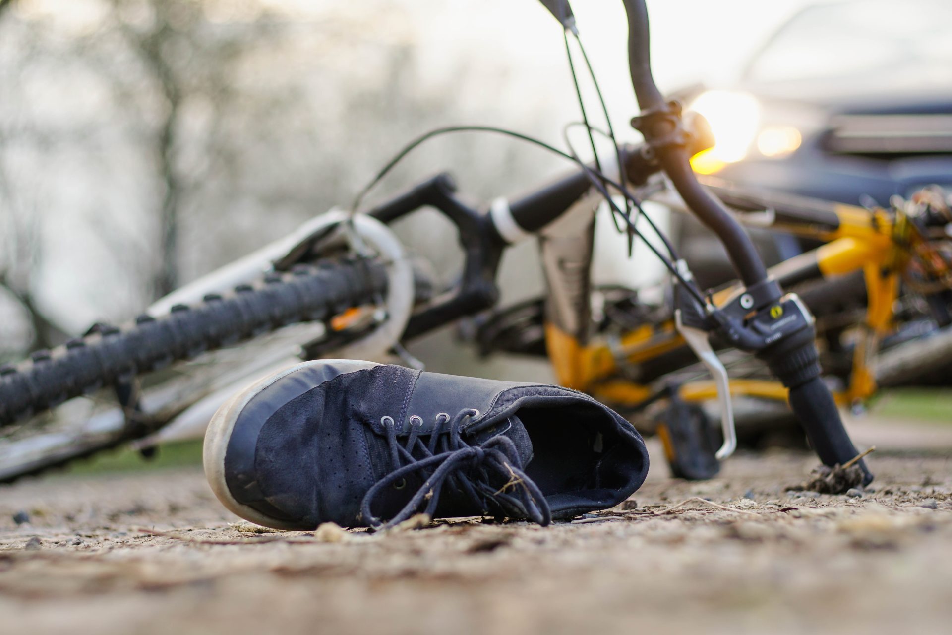close up of a sneakers on the road near bicycle af 2023 11 27 04 55 43 utc