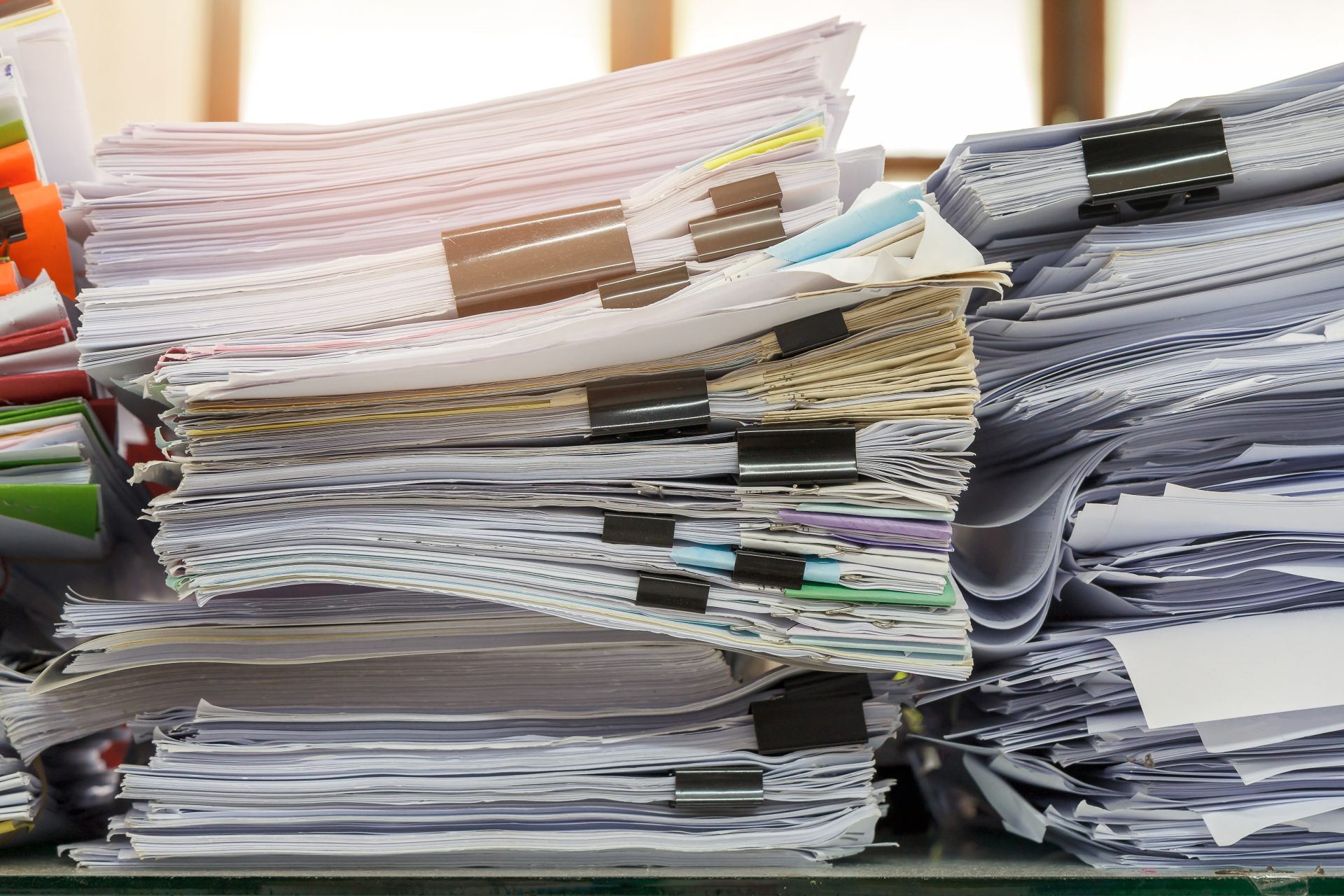 close up of business documents stack on desk rep 2023 11 27 05 07 09 utc
