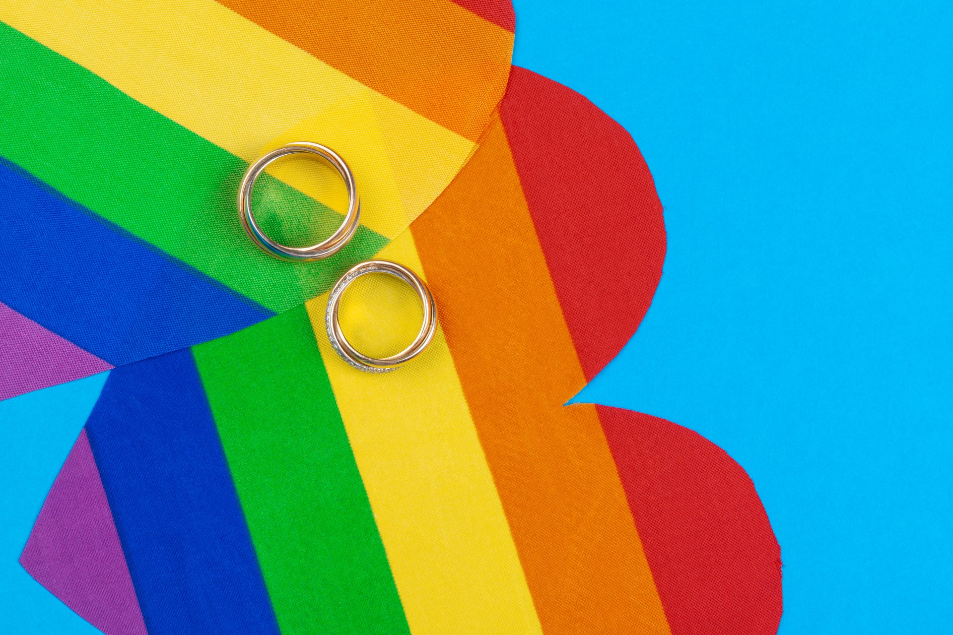 gay marriage concept with rainbow flag and rings 2023 11 27 05 21 38 utc