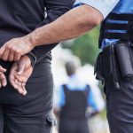 handcuffs crime and police with man criminal outd 2023 11 27 05 24 43 utc