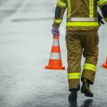 highway worker preparing for road closure moving t 2023 11 27 05 30 03 utc