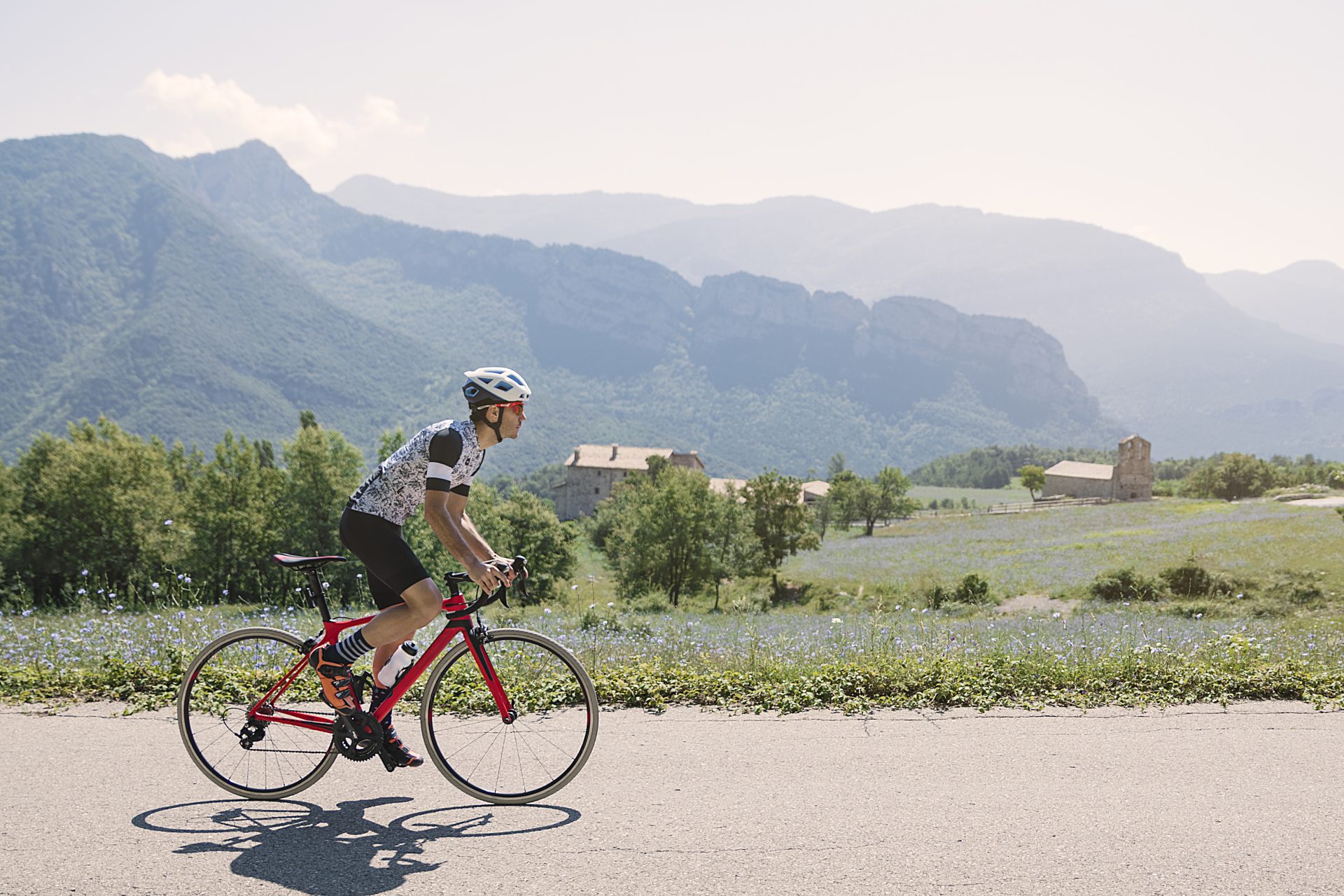men cycling mountain road at morning 2023 11 27 05 09 09 utc