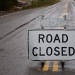 road closed sign on the street in yellowstone park 2023 11 27 05 24 02 utc