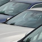 roofs of several cars a lot of cars stand close a 2023 11 27 05 07 04 utc