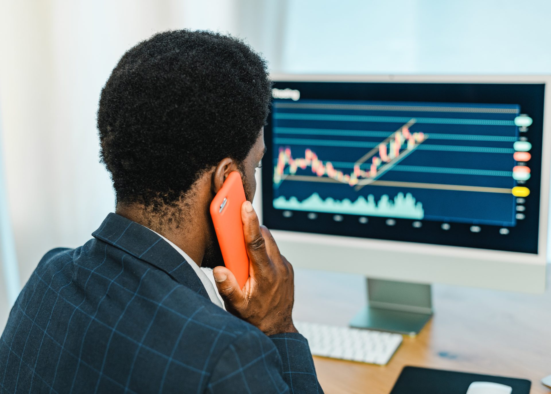 black male trader talking on smartphone 2023 11 27 05 15 56 utc