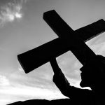 bronze statue of jesus carrying his cross on the 2023 11 27 05 07 44 utc