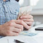 businessman calculates the costs incurred or salar 2023 11 27 04 53 22 utc