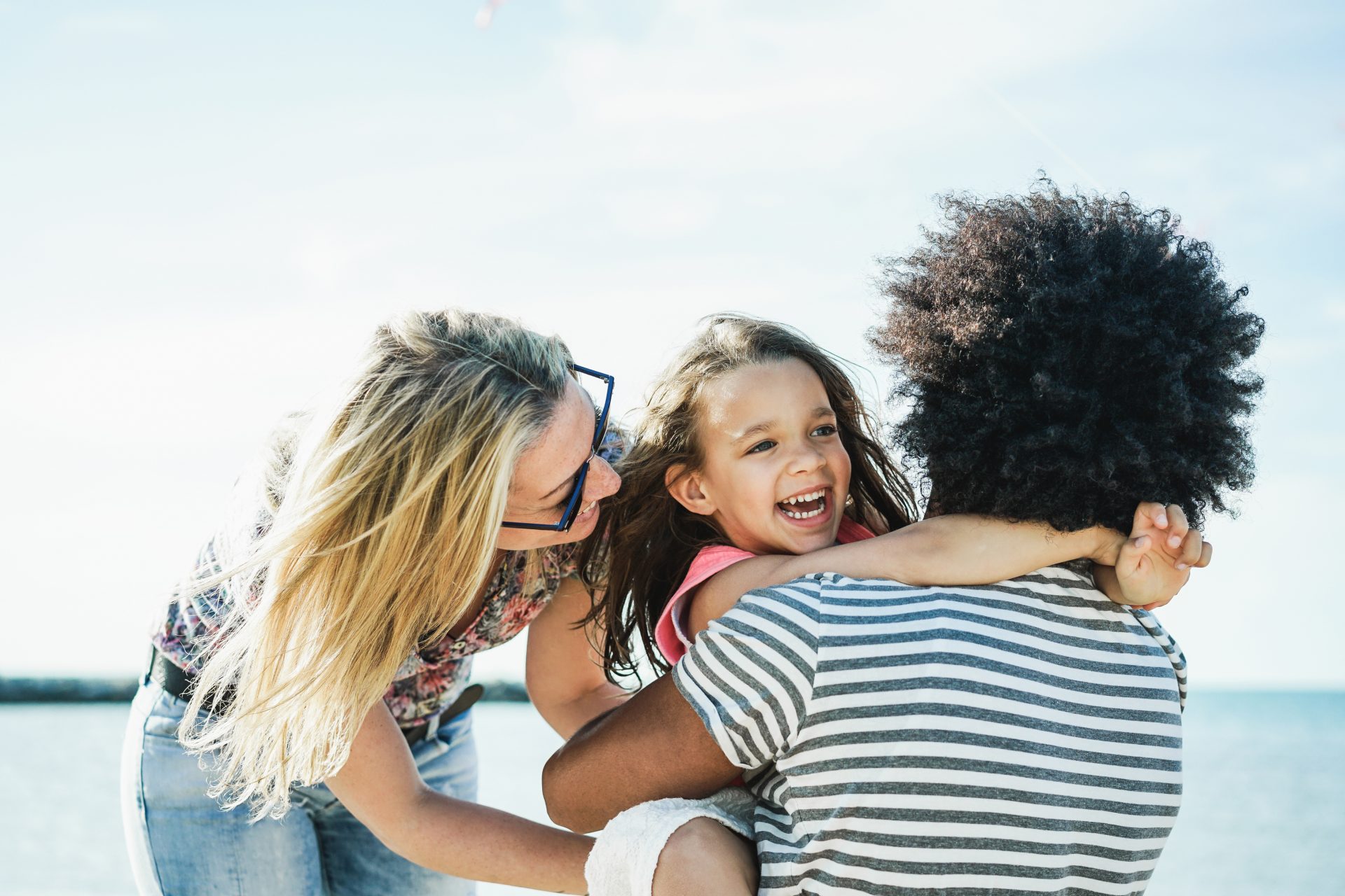 happy family having fun on the beach 2023 11 27 04 57 21 utc