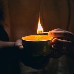 lighting candle in the dark 2023 11 27 05 35 42 utc