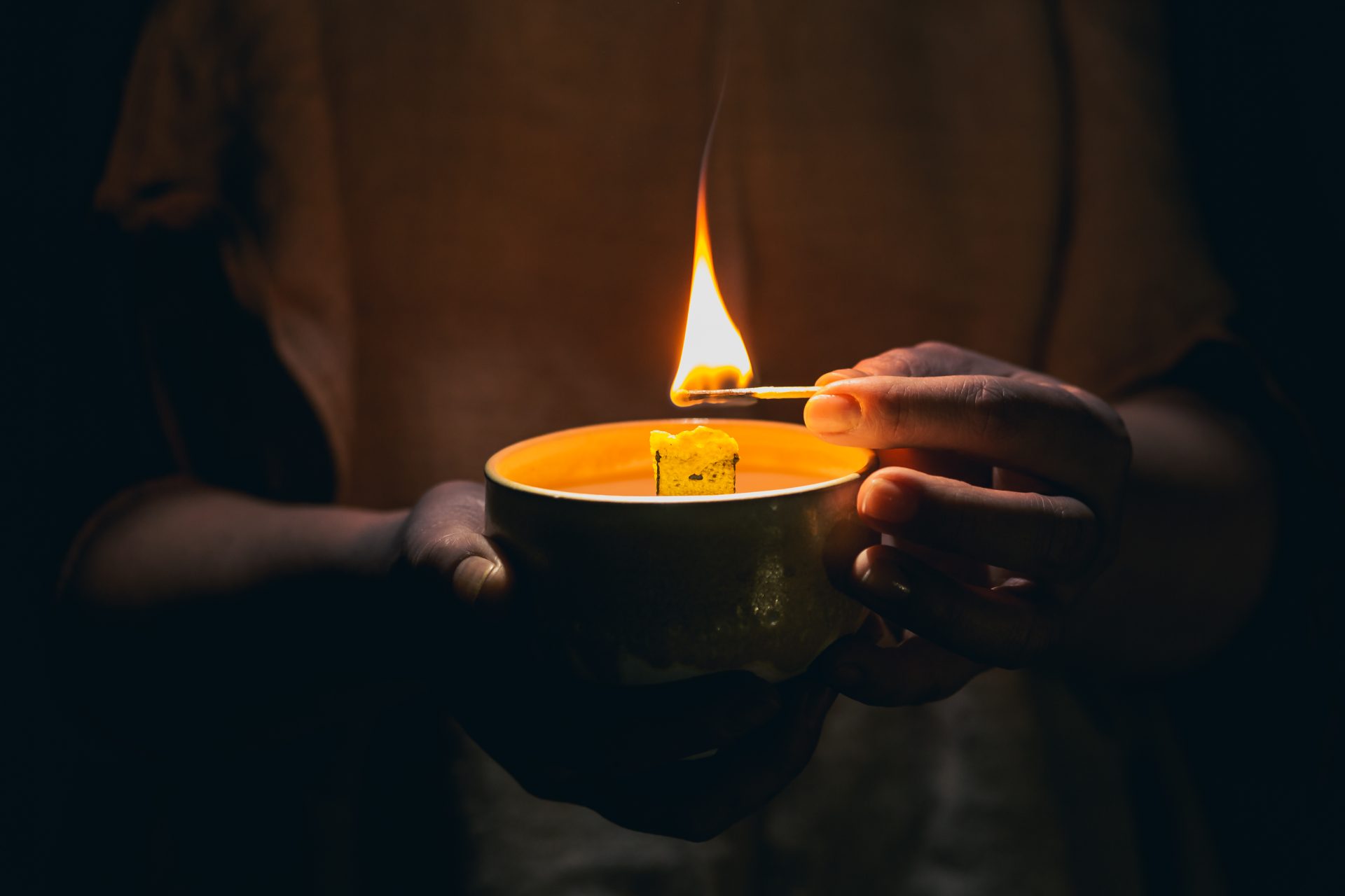lighting candle in the dark 2023 11 27 05 35 42 utc