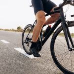 professional cyclist riding bike on paved road 2023 11 27 05 31 56 utc
