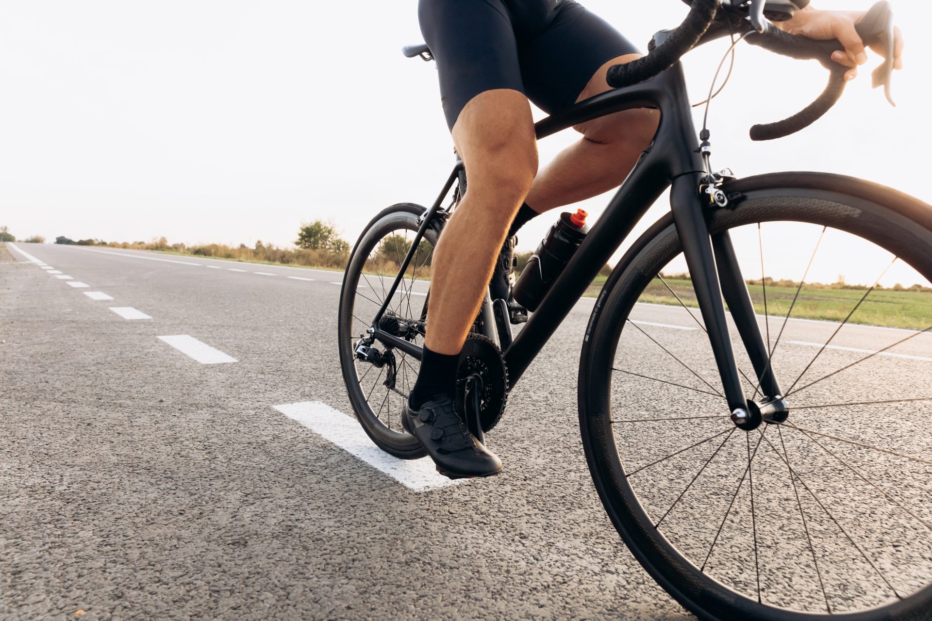professional cyclist riding bike on paved road 2023 11 27 05 31 56 utc