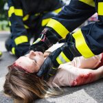 unrecognizable firefighters helping a young injure 2023 11 27 05 33 44 utc