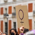 women hands supporting feminist symbol placard on 2023 11 27 05 30 14 utc