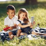 cute children with watermelons in a park 2023 11 27 05 24 30 utc