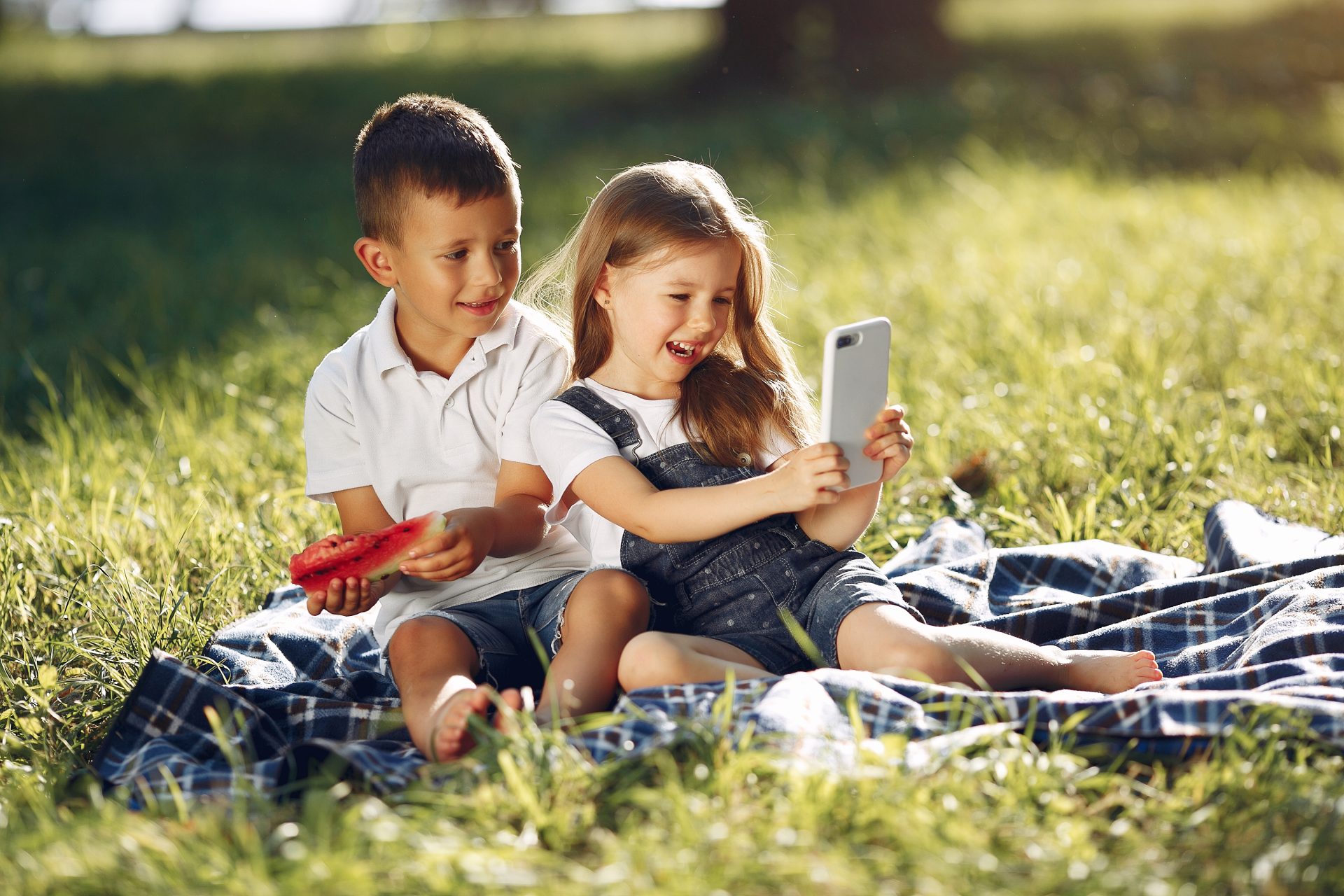 cute children with watermelons in a park 2023 11 27 05 24 30 utc