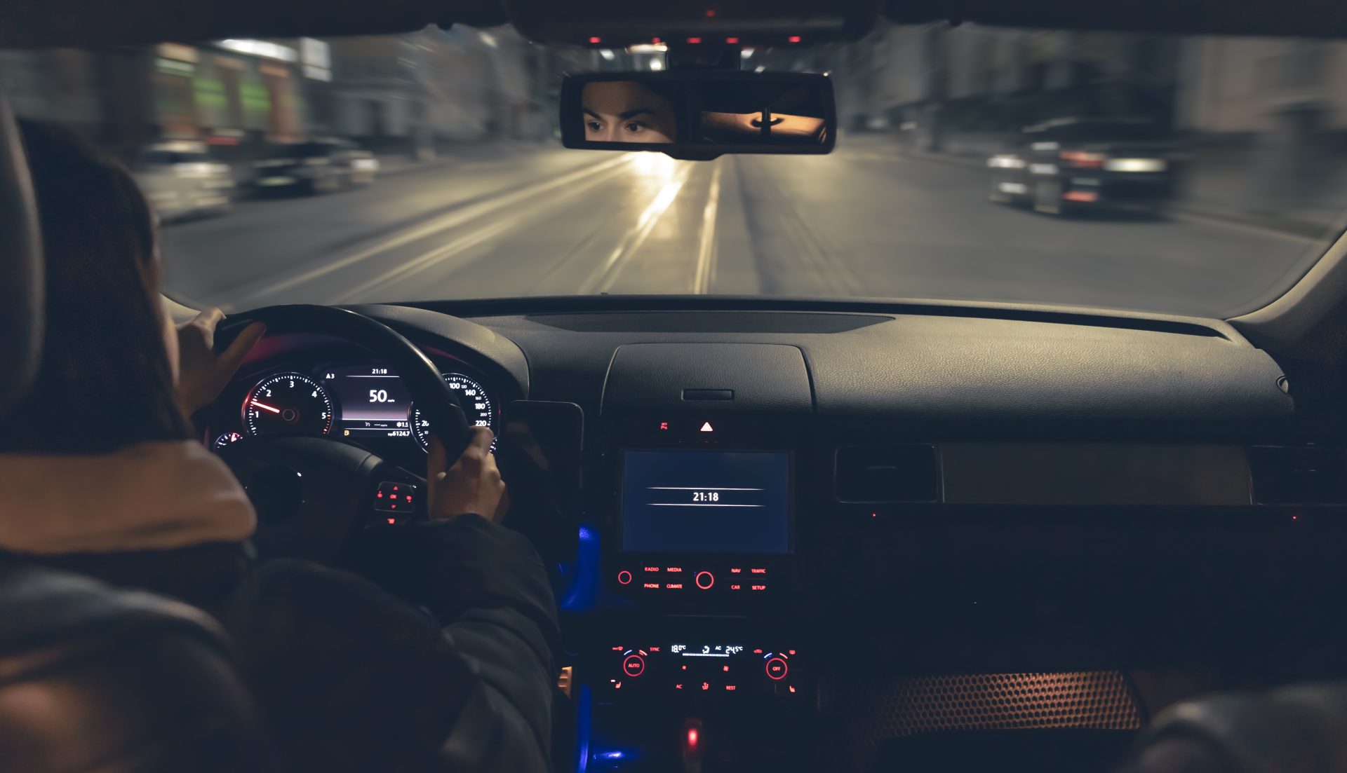 driving a car at night a woman driving her modern 2024 03 06 16 35 05 utc