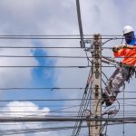 electrician is installing cable lines on electric 2024 02 02 16 18 12 utc