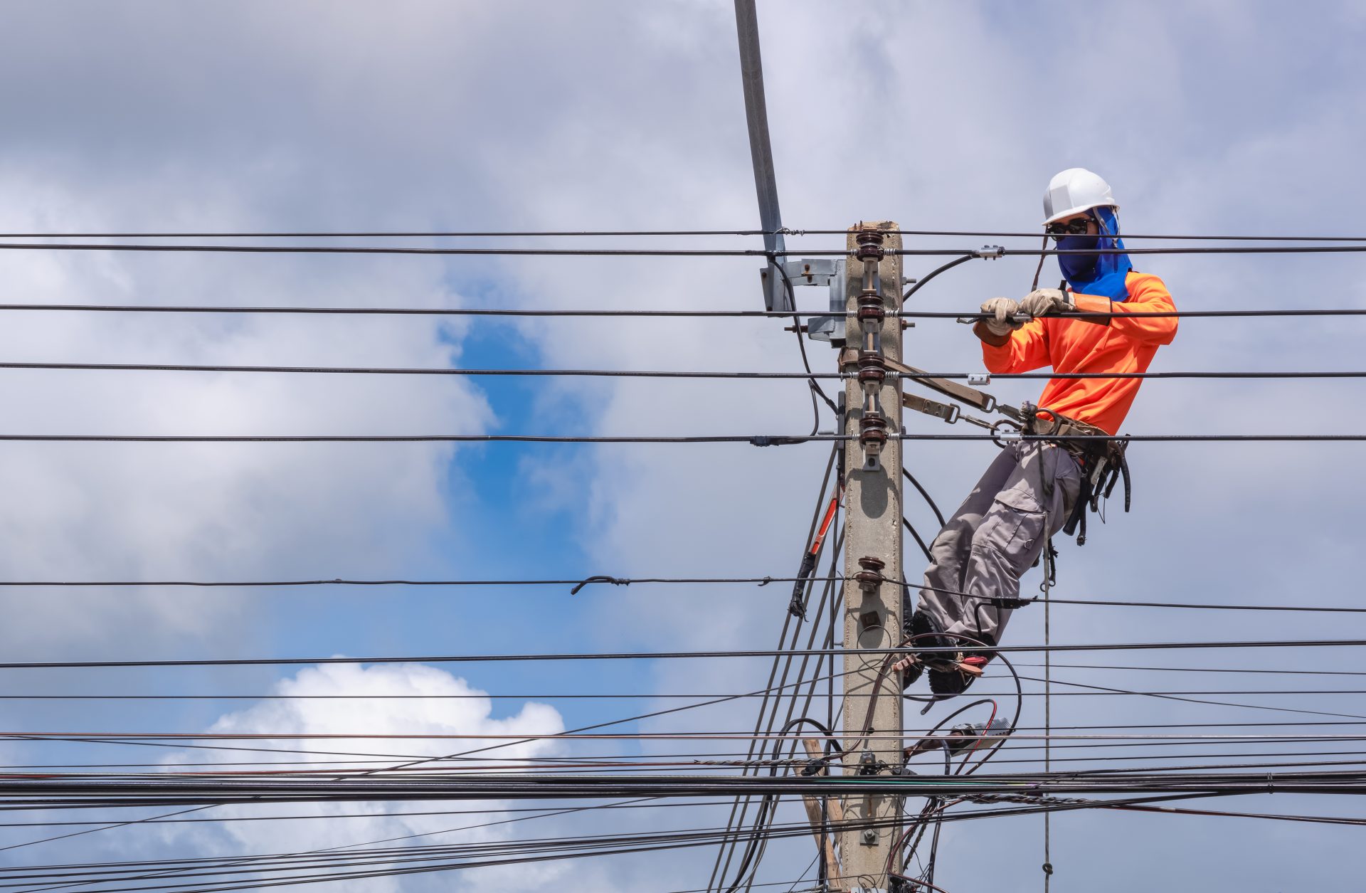 electrician is installing cable lines on electric 2024 02 02 16 18 12 utc