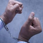 hands of a man with handcuffs close up 2023 11 27 04 54 50 utc