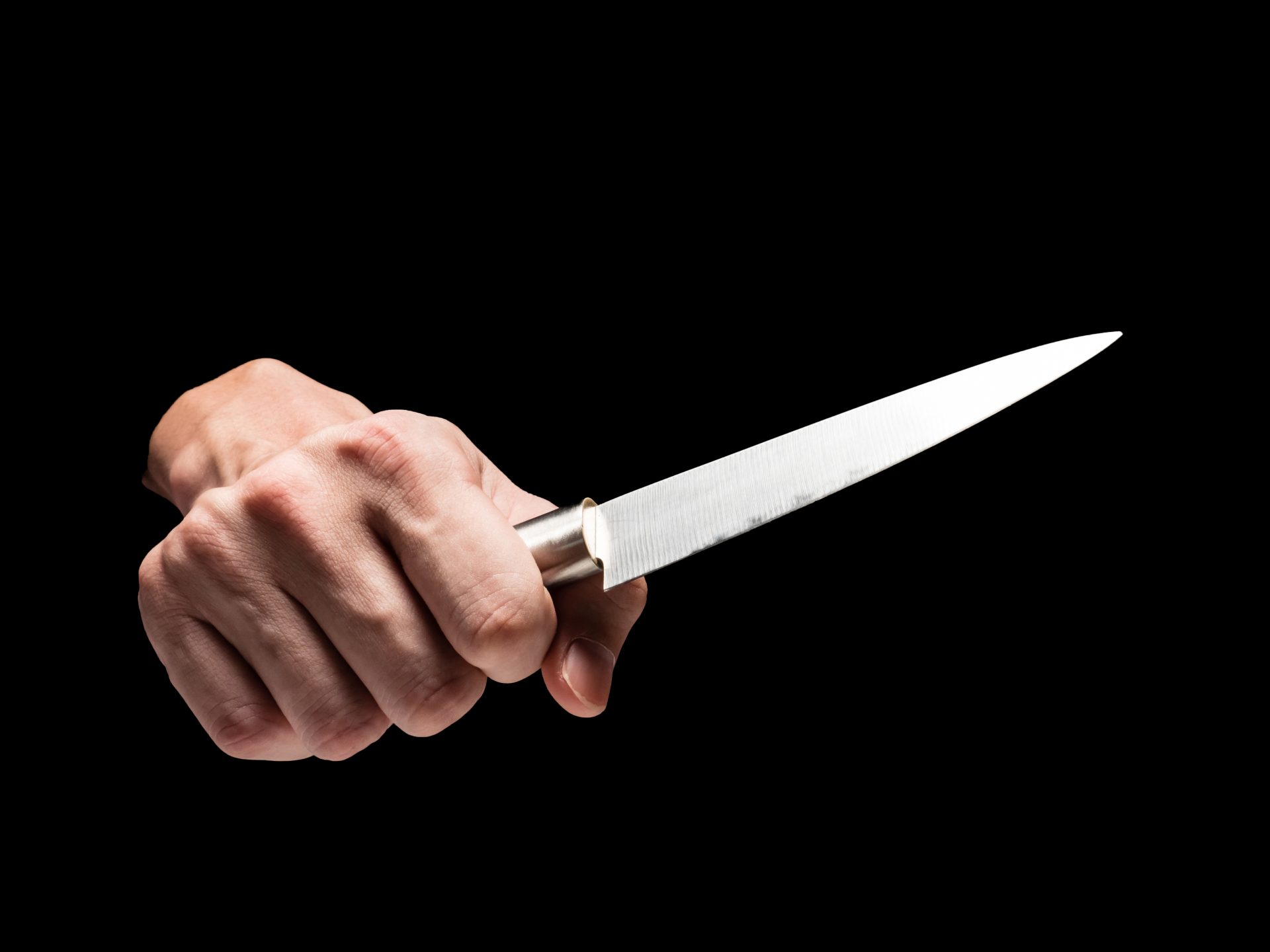 male hand holding knife on black background 2023 11 27 05 20 06 utc