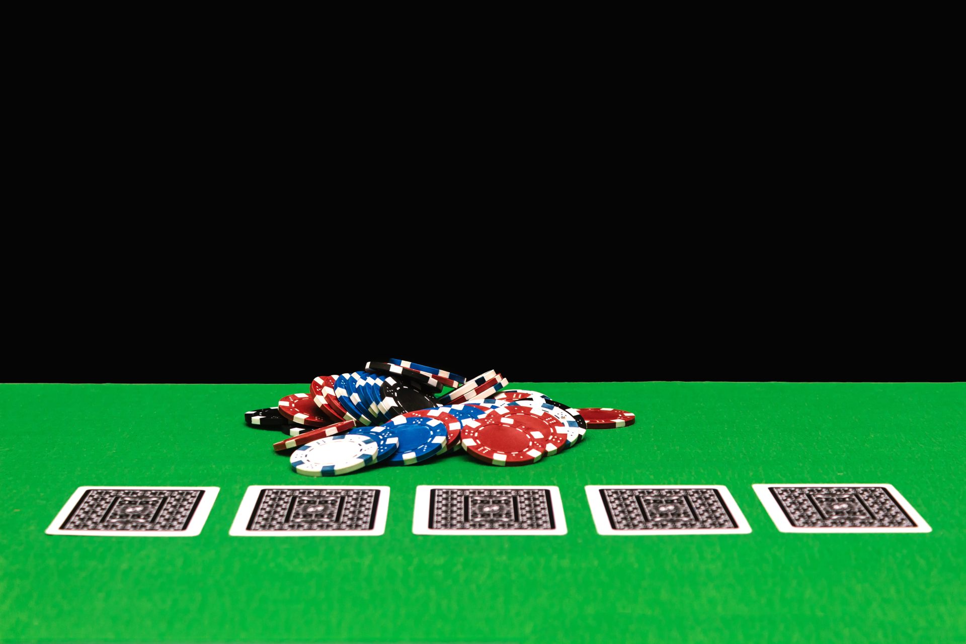 poker chips on a gaming table in a casino 2023 11 27 05 30 36 utc