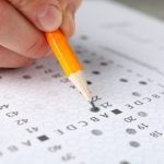 student fills answers test sheet close up 2023 11 27 05 18 44 utc