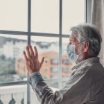 thoughtful depressed old man looking out of window 2023 11 27 05 33 32 utc