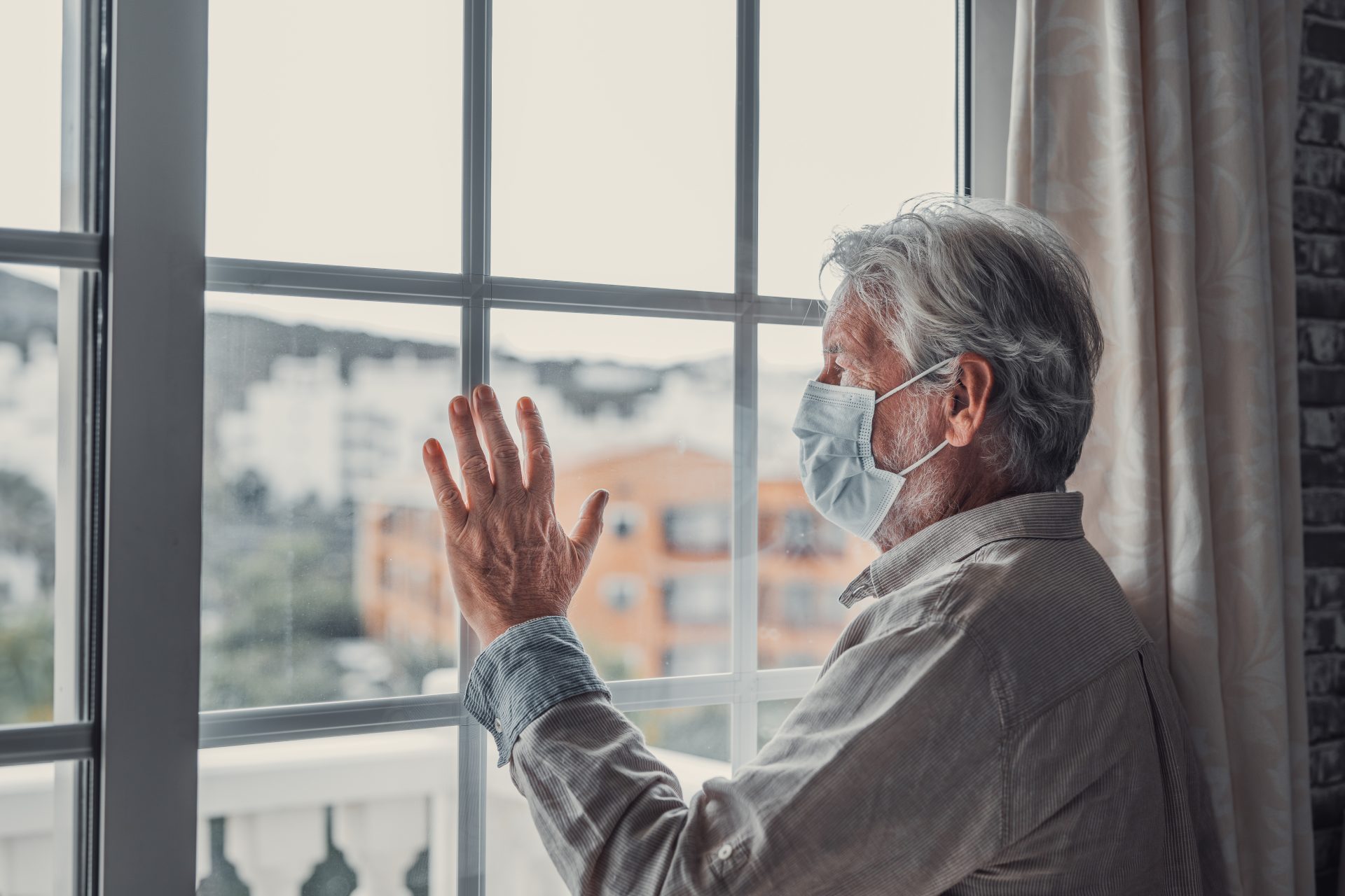 thoughtful depressed old man looking out of window 2023 11 27 05 33 32 utc