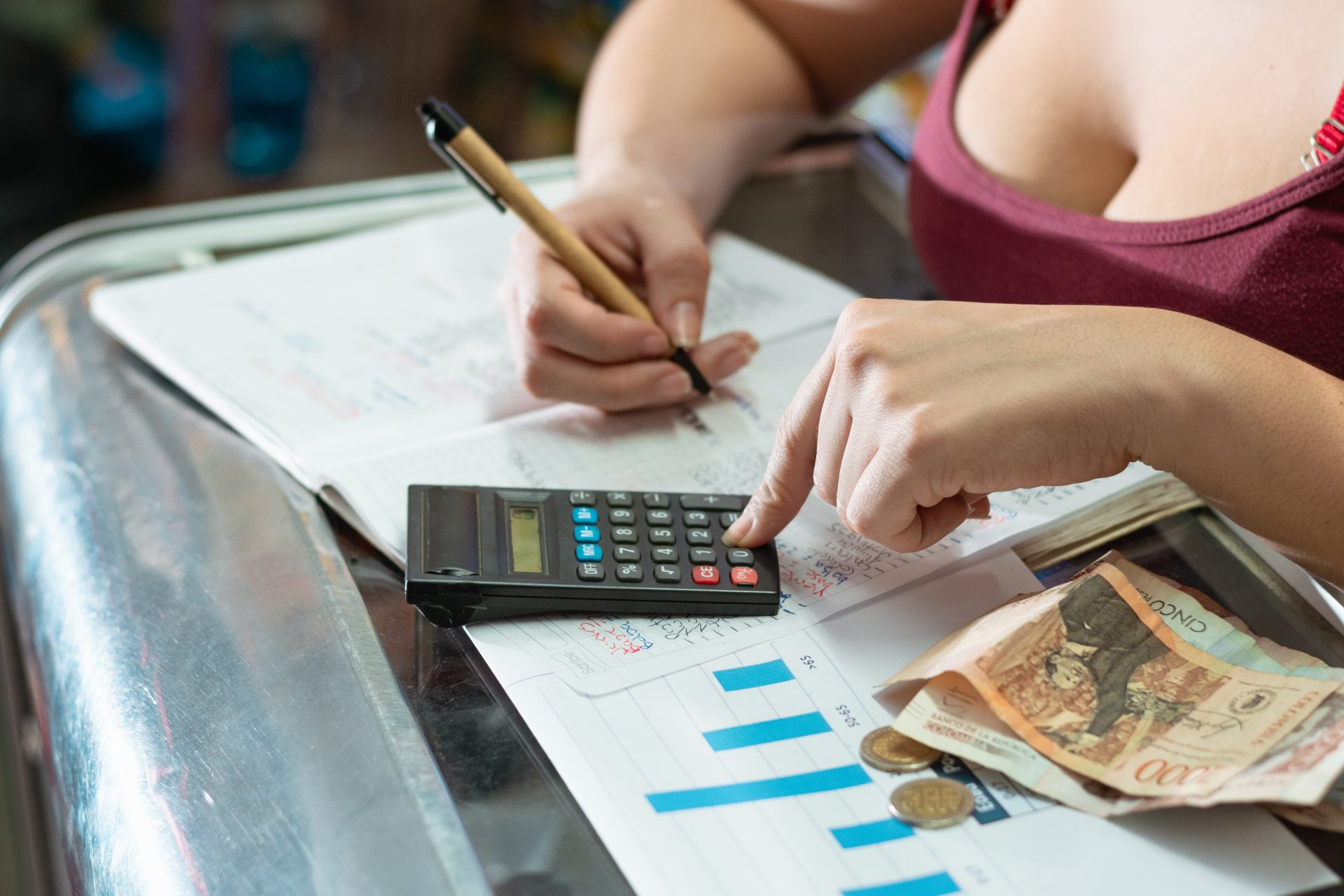 woman reviewing her business statistics chart bal 2023 12 18 19 16 20 utc
