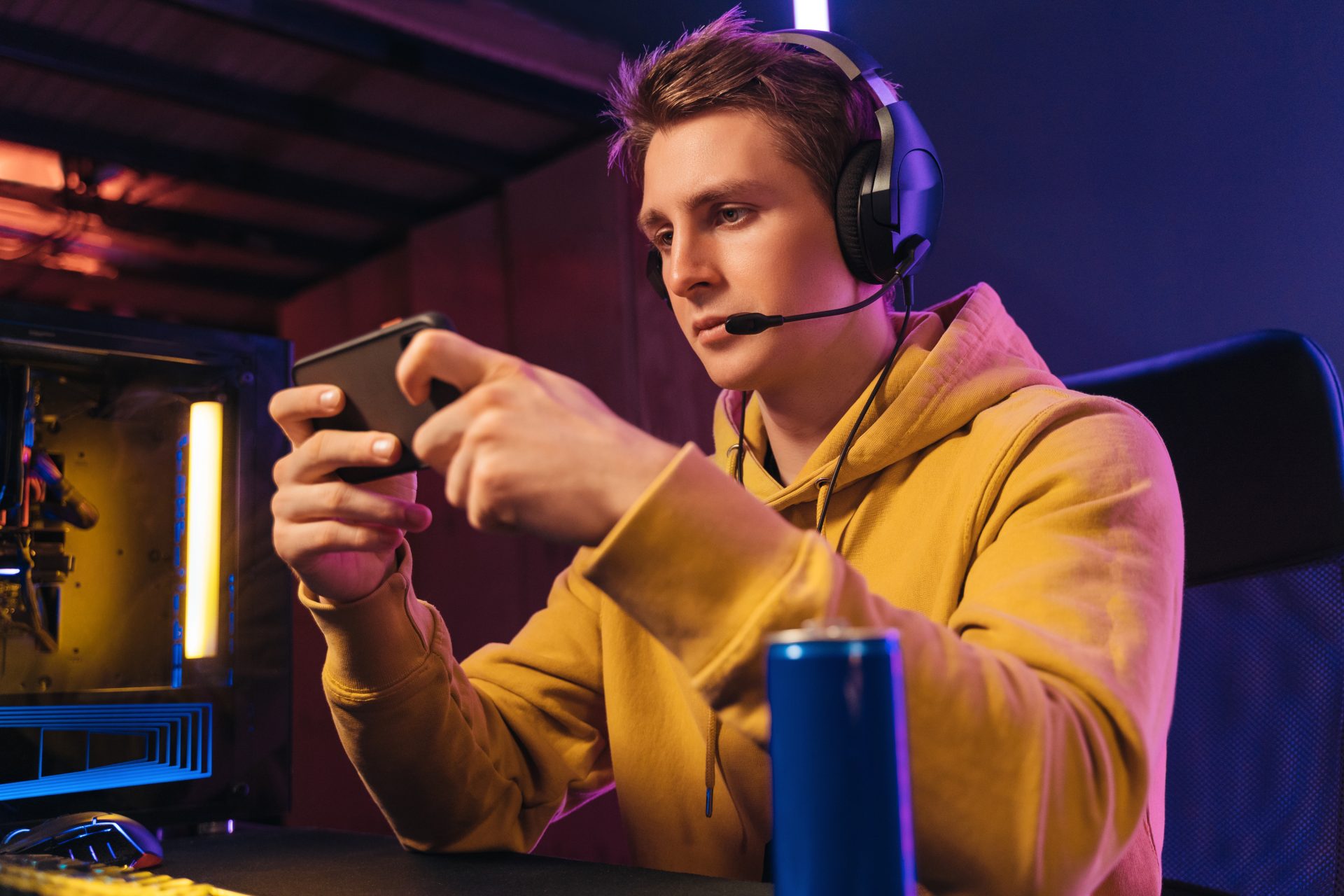 young pro gamer playing in online mobile video gam 2023 11 27 04 57 57 utc