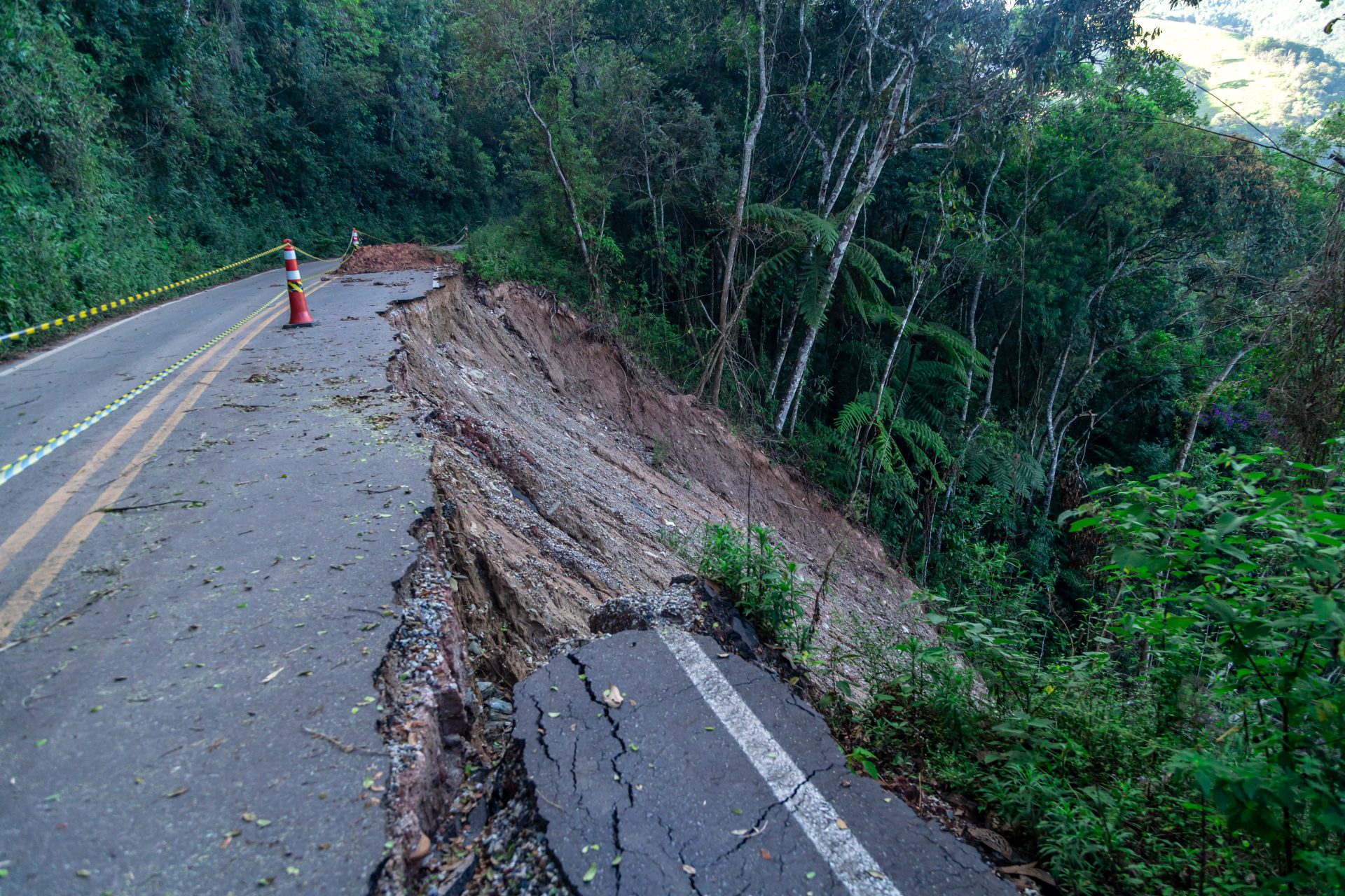asphalt road damaged by a landslide in a mountain 2023 11 27 04 59 03 utc