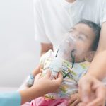 close up of asian little baby boy is treated respi 2023 11 27 05 30 08 utc