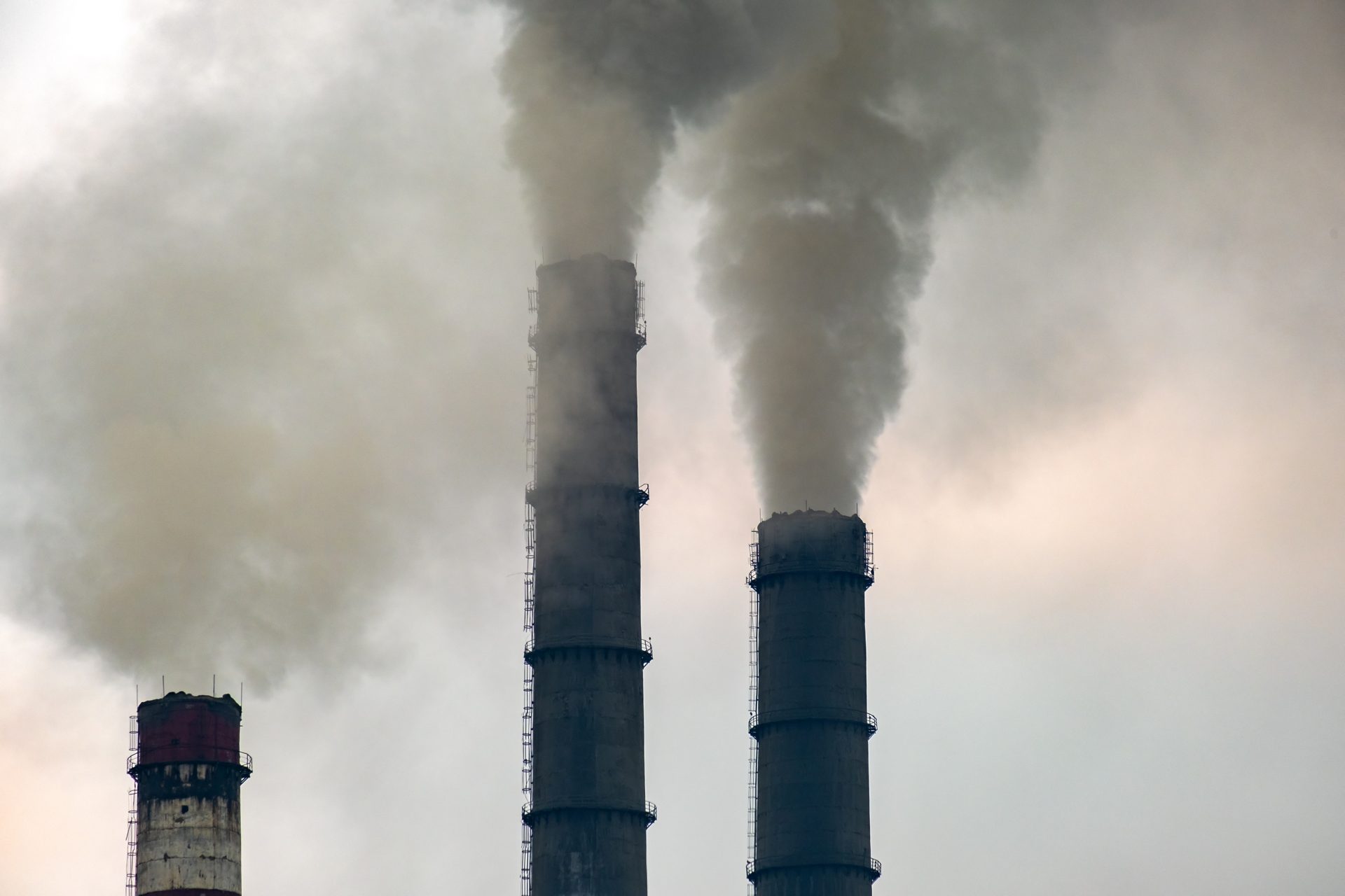 coal power plant high pipes with black smoke movin 2023 11 27 04 51 22 utc