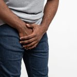 cropped of black guy holding his groin 2023 11 27 05 24 21 utc
