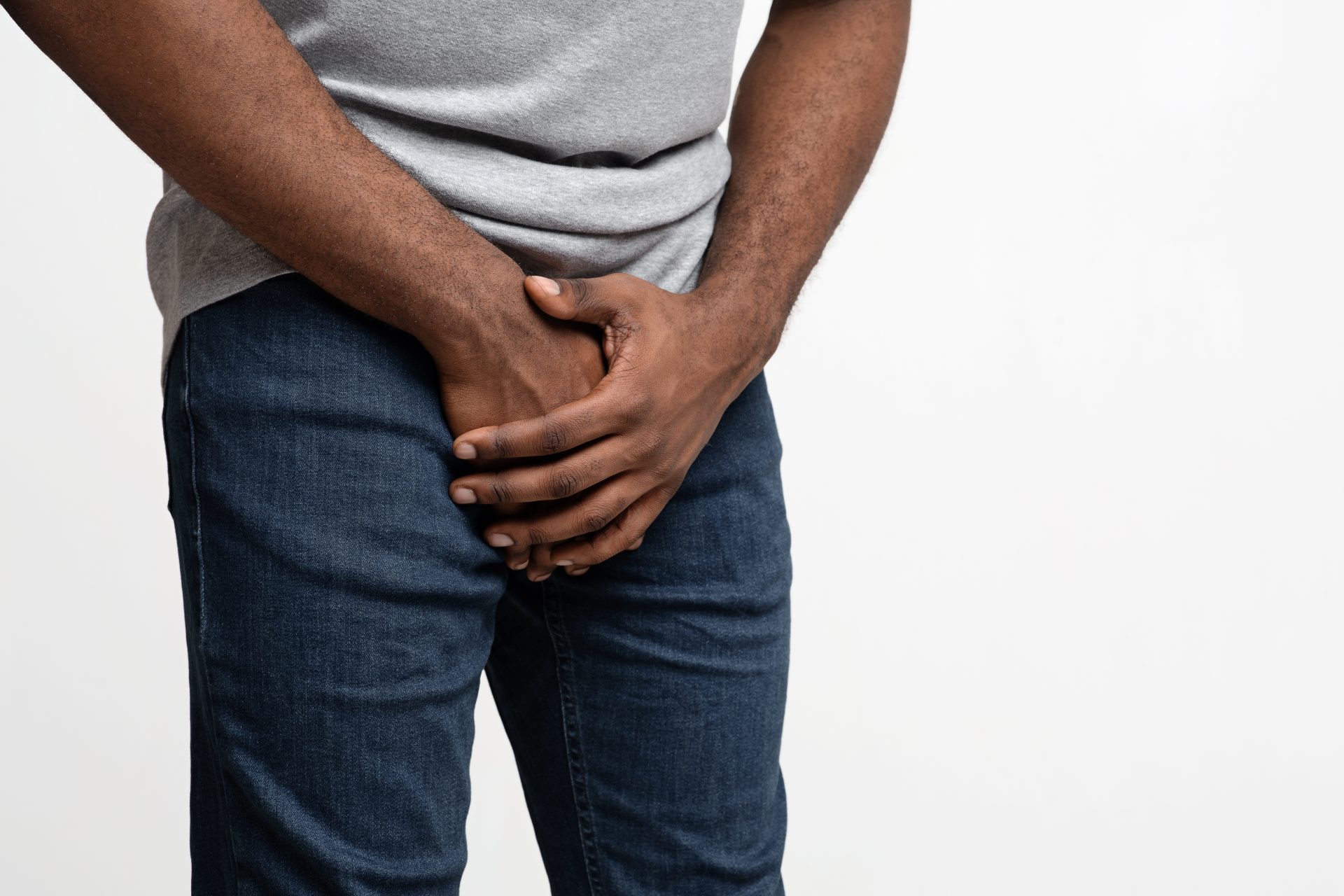 cropped of black guy holding his groin 2023 11 27 05 24 21 utc