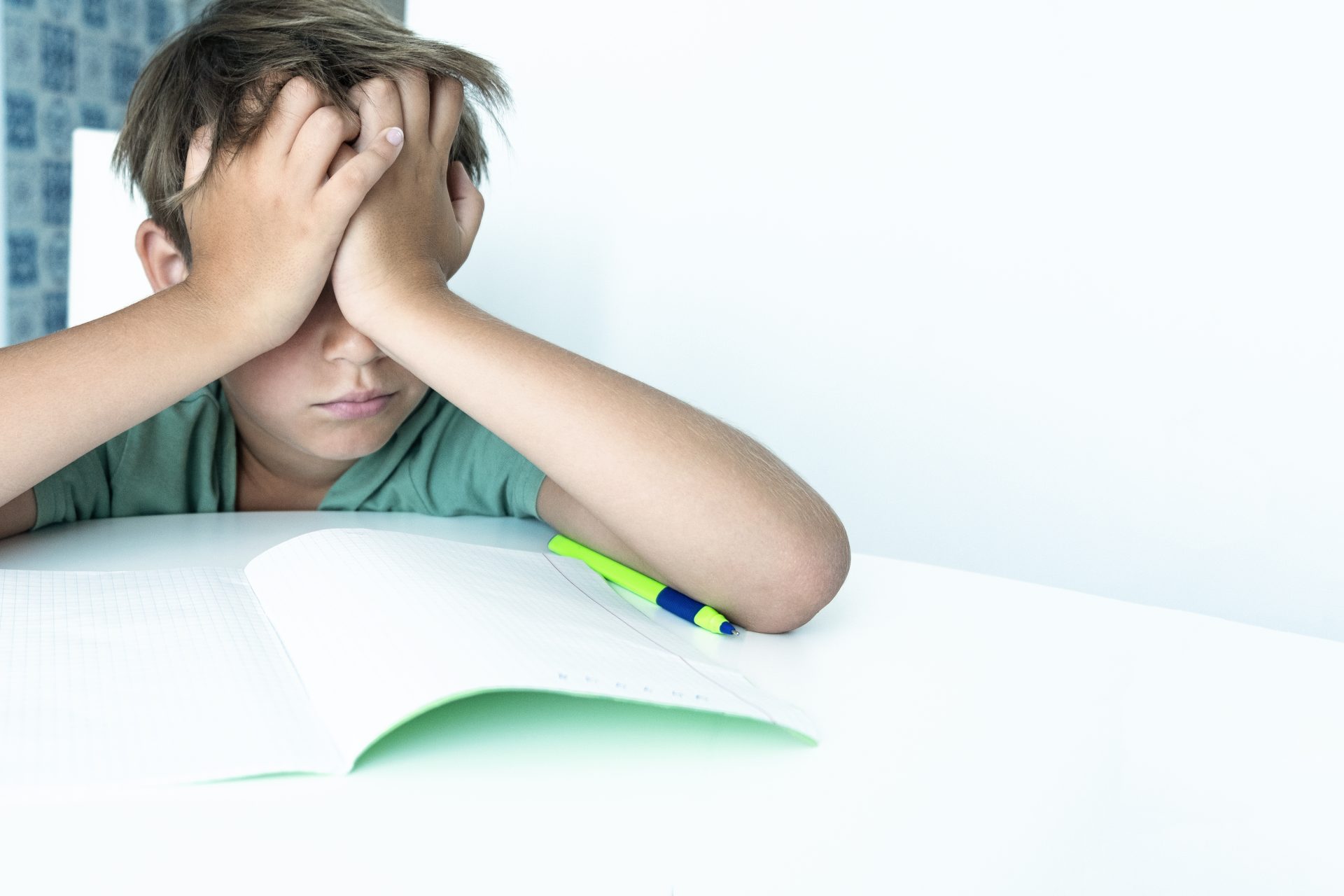 crying schoolboy doing homework at home writes in 2023 11 27 05 11 56 utc