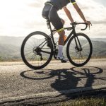 cyclist sports on road sun rays and shadows from 2023 11 27 05 01 26 utc