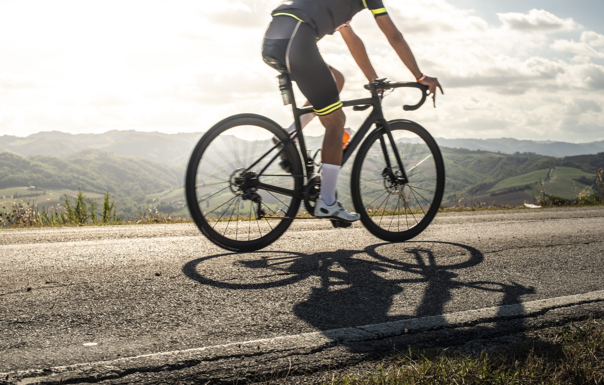 cyclist sports on road sun rays and shadows from 2023 11 27 05 01 26 utc