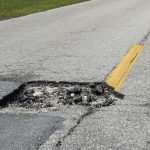 dangerous pothole on american road surface ruined 2024 03 21 23 14 30 utc