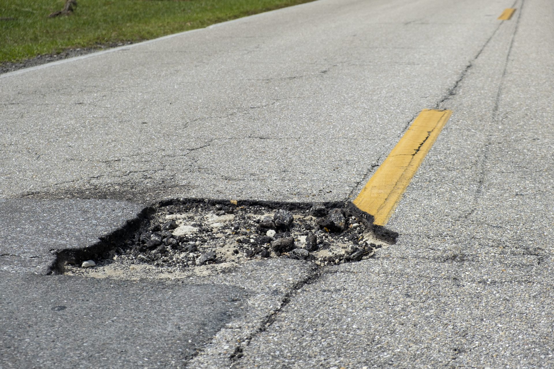 dangerous pothole on american road surface ruined 2024 03 21 23 14 30 utc